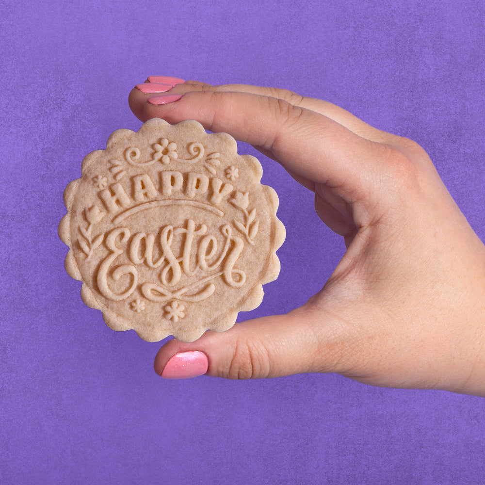 Embossed sugar cookie that says Happy Easter
